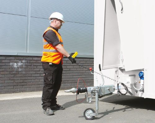 Unhitch from towing vehicle and operate hydraulics using the push button controls